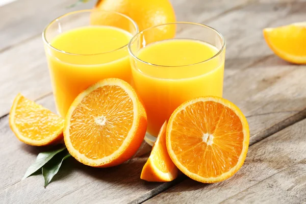 Orange juice on table — Stock Photo, Image