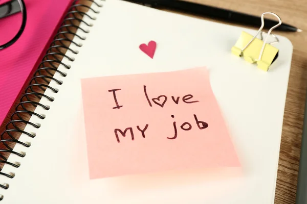 Inscription I love my job in notebook close up — Stock Photo, Image