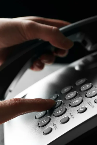 Finger pressing number button on telephone to make a call, close up — Stock Photo, Image