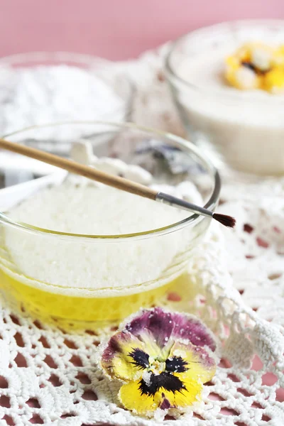 Making candied violet flowers with egg whites and sugar, on color wooden background — Stock Photo, Image