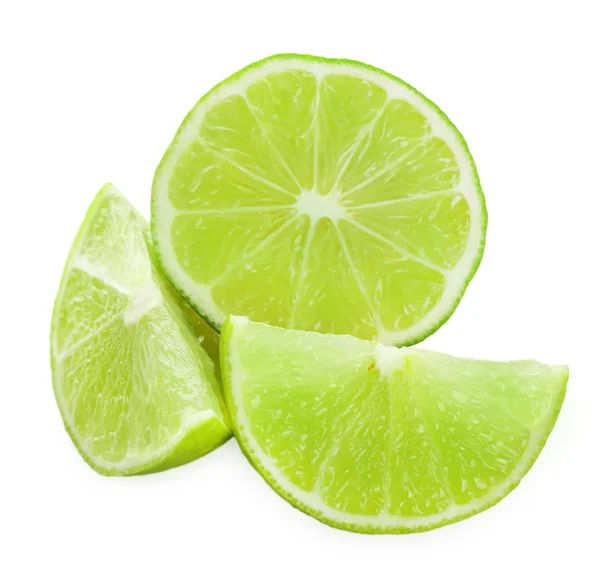 Sliced fresh limes isolated on white — Stock Photo, Image