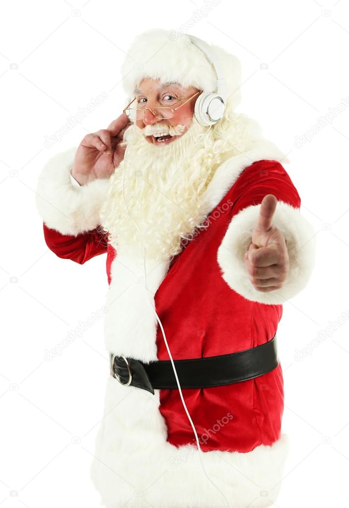 santa claus with headphones listening to music isolated on white background stock photo - White Santa Claus santa claus with headphones listening to music isolated on white background stock photo - White Santa Claus