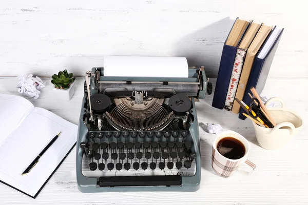 Retro typewriter on wooden background — Stock Photo, Image