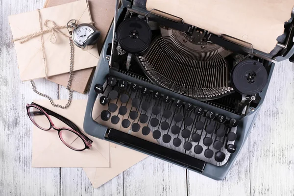 Retro typewriter on wooden table, top view — Stock Photo, Image