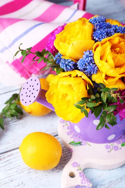 Composition with fresh spring flowers on wooden background — Stock Photo, Image