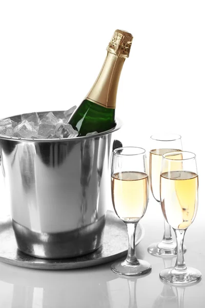 Glasses of champagne on bright background — Stock Photo, Image