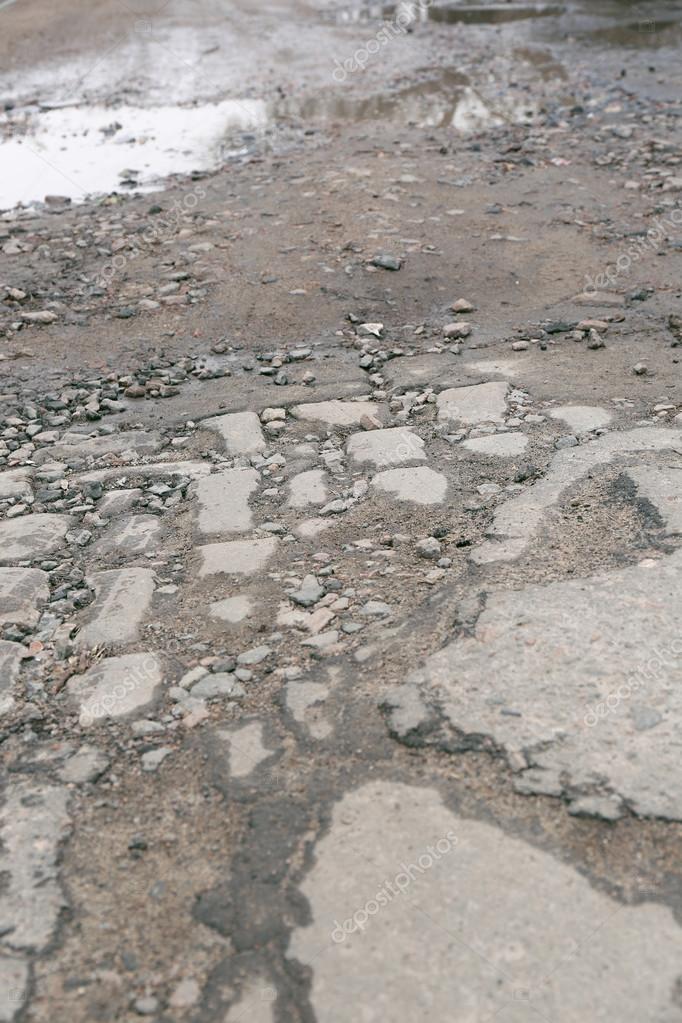 Very bad quality road Stock Photo by ©belchonock 74441803