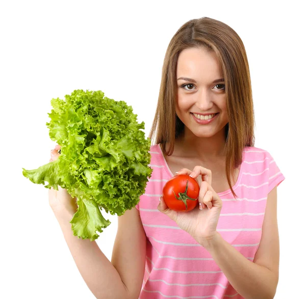 Healthy young woman with bunch of lettuce and tomato isolated on white — Stock Photo, Image
