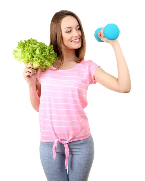 Healthy young woman with lettuce and dumbbell isolated on white — Stock Photo, Image