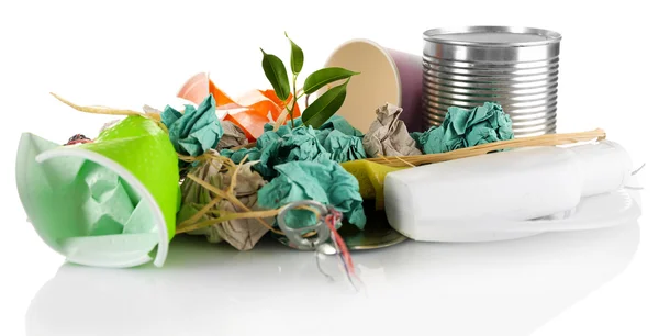 Pile of rubbish with plant — Stock Photo, Image