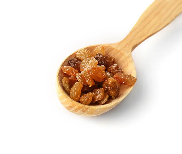 Raisins in cucchiaio di legno isolato su bianco — Foto Stock