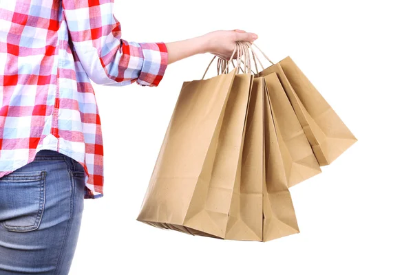 Woman holding paper shopping bag isolated on white — Stock Photo, Image
