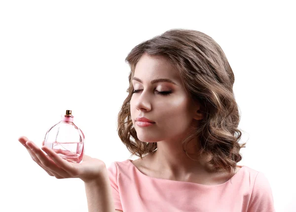 Beautiful woman with perfume bottle isolated on white — Stock Photo, Image