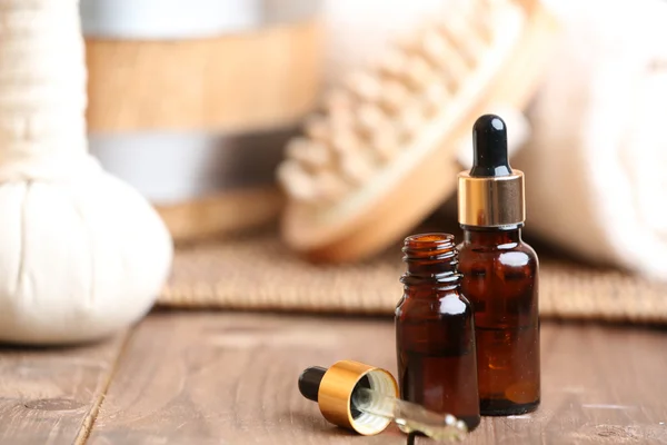 Beautiful spa composition with aroma oil on table close up — Stock Photo, Image