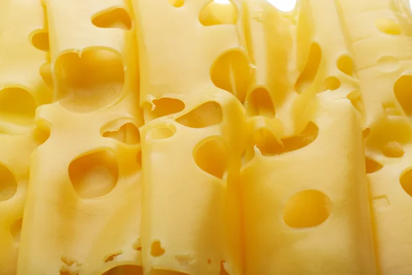 Slices of cheese close up — Stock Photo, Image