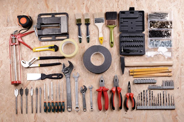 Set of tools on plywood — Stock Photo, Image