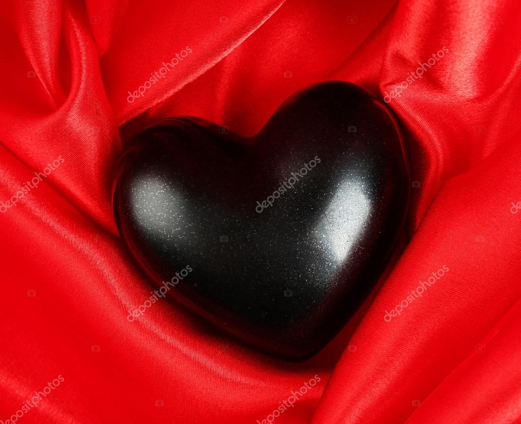 Black heart on fabric background Stock Photo by ©belchonock 74656075 Black heart on fabric background Stock Photo by ©belchonock 74656075