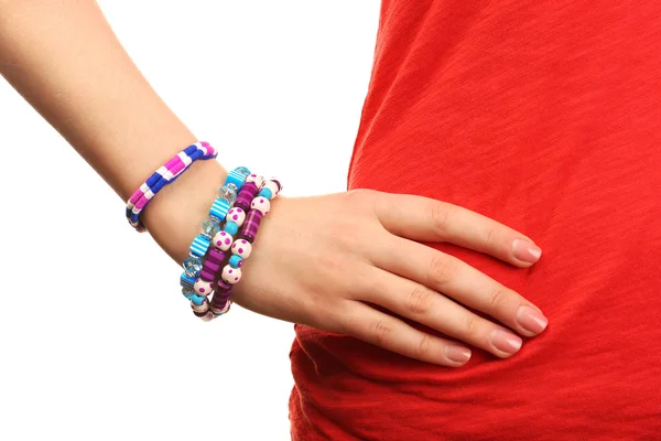 Female hand with bracelets isolated on white — Stock Photo, Image