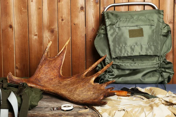 Hunting gear on wooden background — Stock Photo, Image