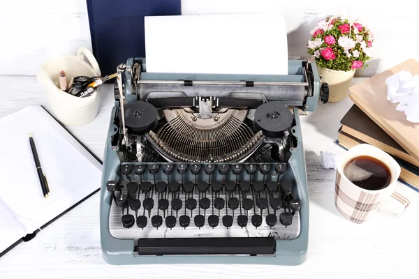 Retro typewriter on wooden background — Stock Photo, Image