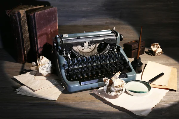 Retro typewriter on wooden background — Stock Photo, Image