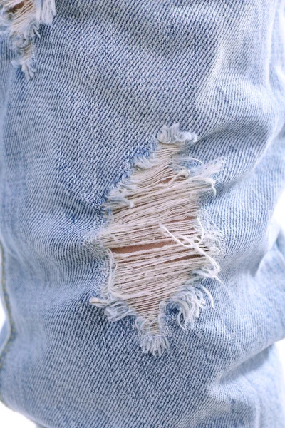 Calça jeans rasgada, close-up — Fotografia de Stock