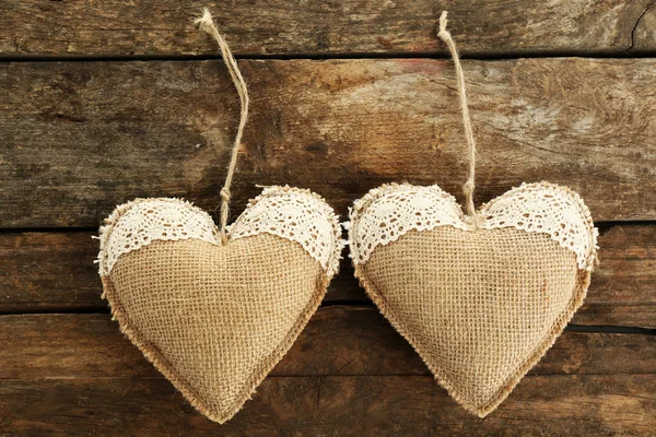Vintage hearts on wooden background — Stock Photo, Image