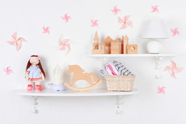 Baby accessories on shelves close-up — Stock Image Baby accessories on shelves close-up Stock Image