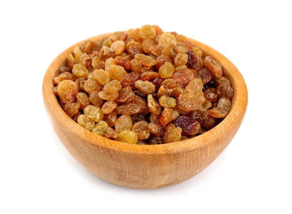 Raisins in bowl isolated on white — Stock Photo, Image