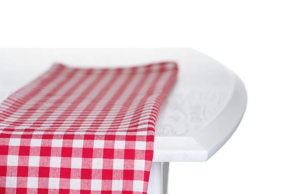 Wooden table with napkin isolated on white — Stock Photo, Image