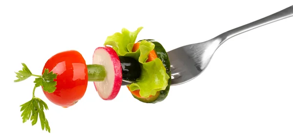 Different fresh vegetables on fork — Stock Photo, Image