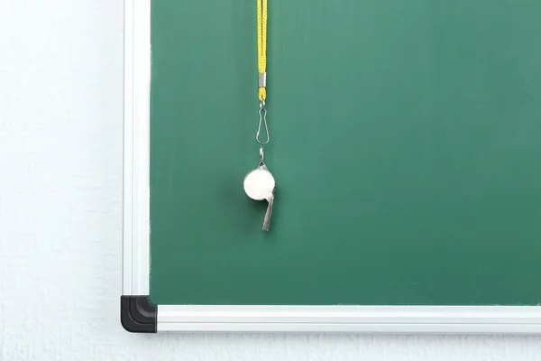 Whistle on blackboard background — Stock Photo, Image