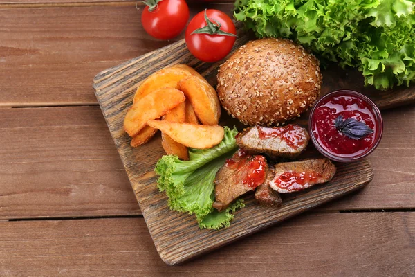 Beef with cranberry sauce and vegetables