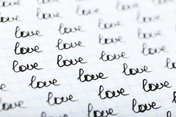 LOVE written on sheet of paper — Stock fotografie