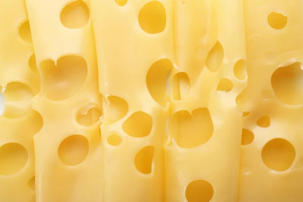 Slices of cheese close up — Stock Photo, Image