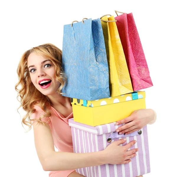 Hermosa joven con bolsas de compras y cajas aisladas en blanco —  Fotos de Stock