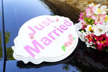 Beautiful flowers on wedding car clipart