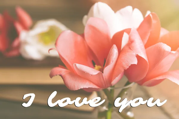 Beautiful tulips in vase, greeting card — Stock Photo, Image