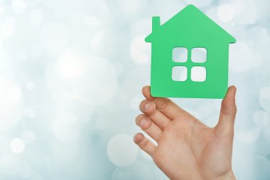 ev ışık tutan el arka plan bulanık