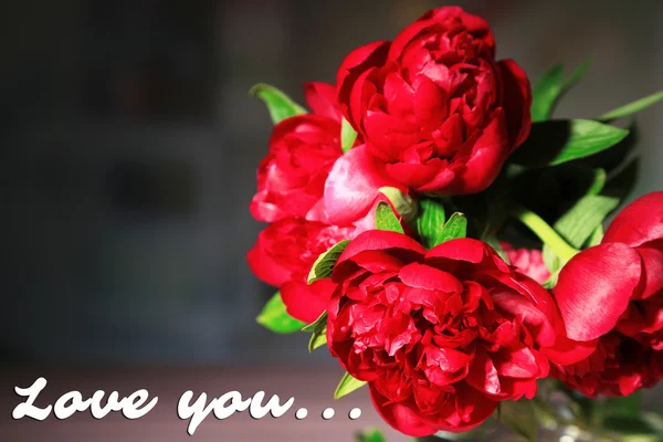 Beautiful peonies on dark background, greeting card — Stock Fotó