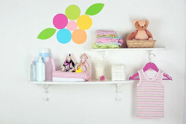 Baby accessories on shelves close-up — Stock Photo, Image