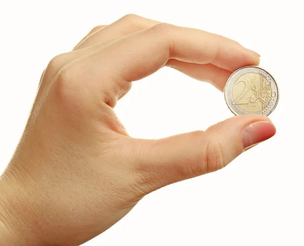 Female hand with coin isolated on white — Stock Photo, Image