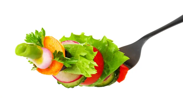 Différents légumes sur fourchette isolés sur blanc — Photo