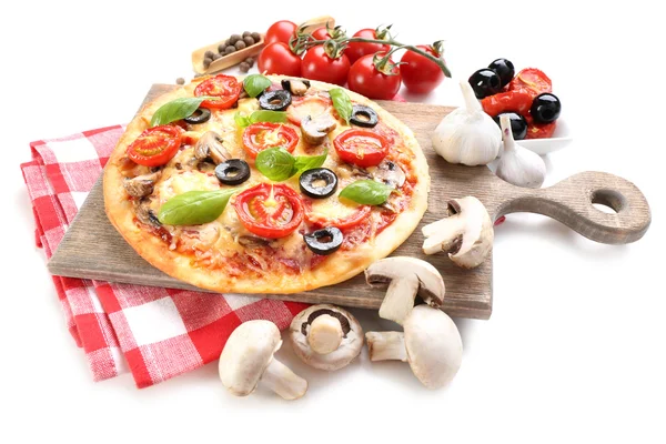 Tasty pizza with vegetables and basil on cutting board isolated on white — Stock Photo, Image