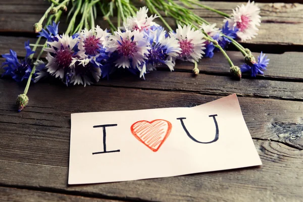 Written message with dry flowers — Stock Photo, Image