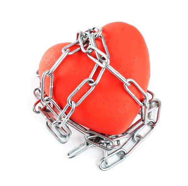 Red heart with metal chain isolated on white — Stock Photo, Image