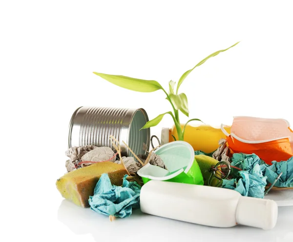 Stapel vuilnis met plant — Stockfoto