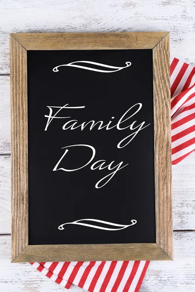 Den rodiny nápis na tabuli na tabulka detail — Stock fotografie
