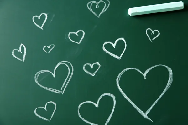 Children drawings on school blackboard background