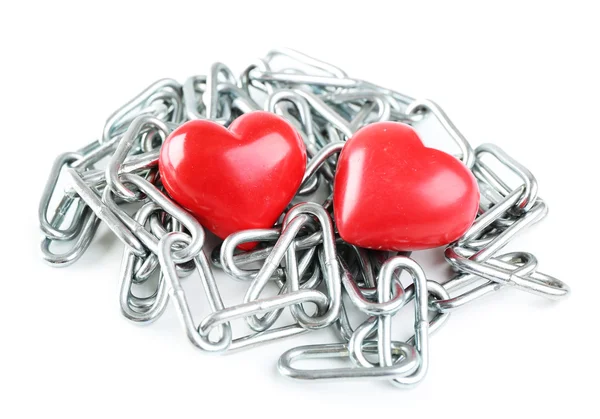 Two red hearts with metal chain isolated on white — Stock Photo, Image